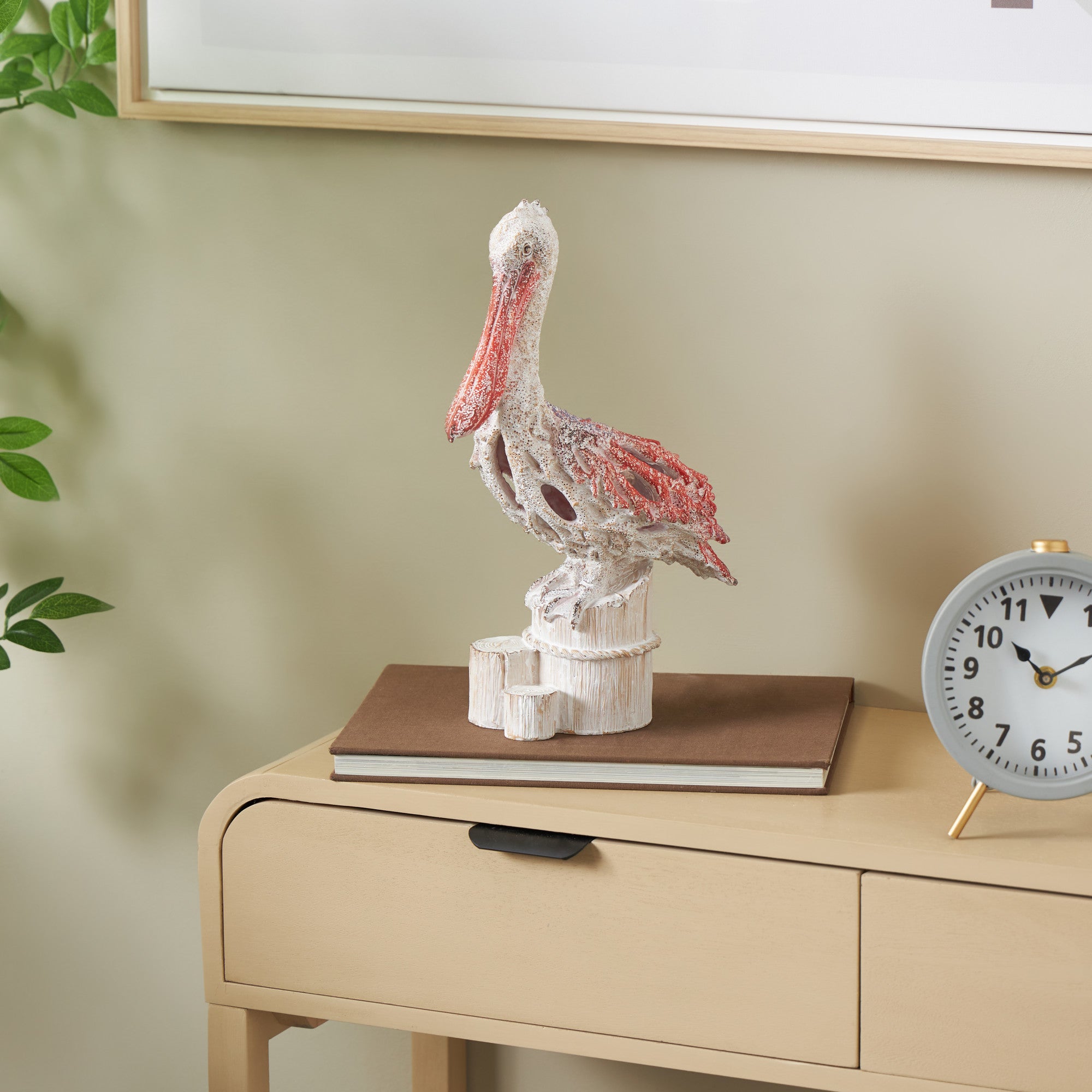 Pelican Polystone Textured Decorative Sculpture with Red Feathers and Round Blocks 8" x 4" x 13"