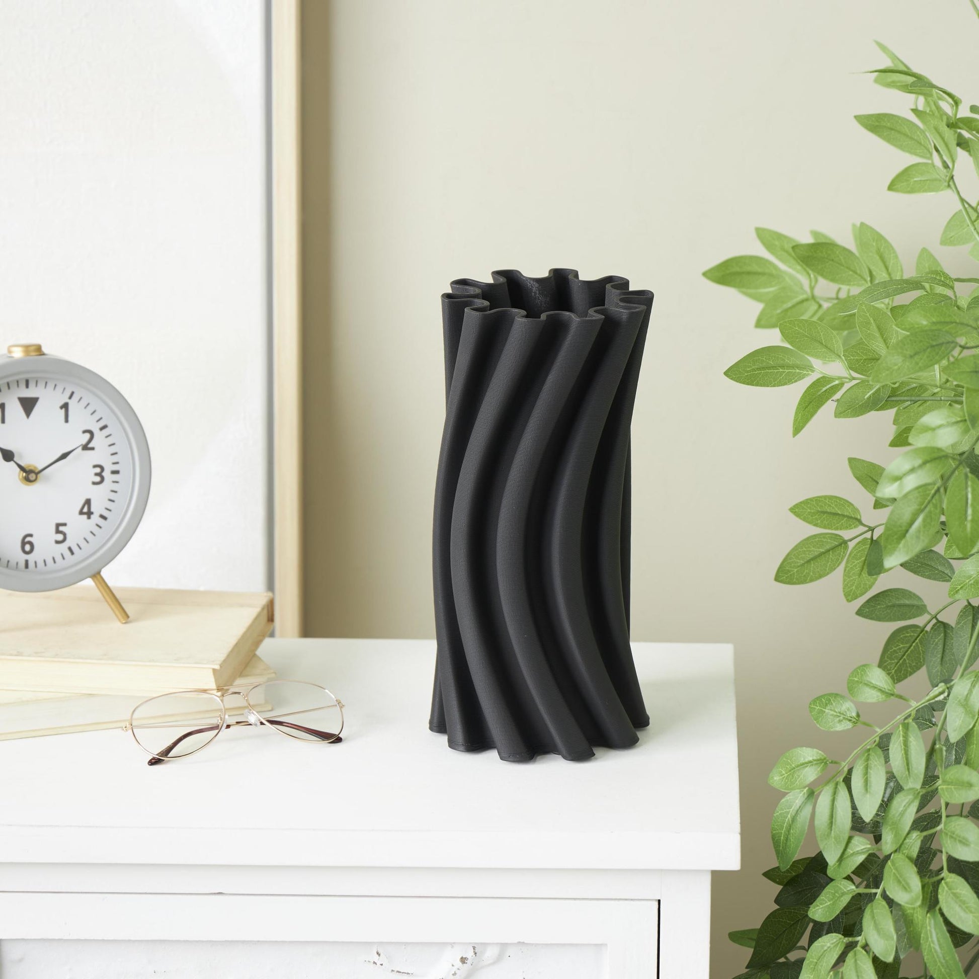 Abstract Black Ceramic Curvy Ribbed Decorative Vase with Floral Shaped Rim
