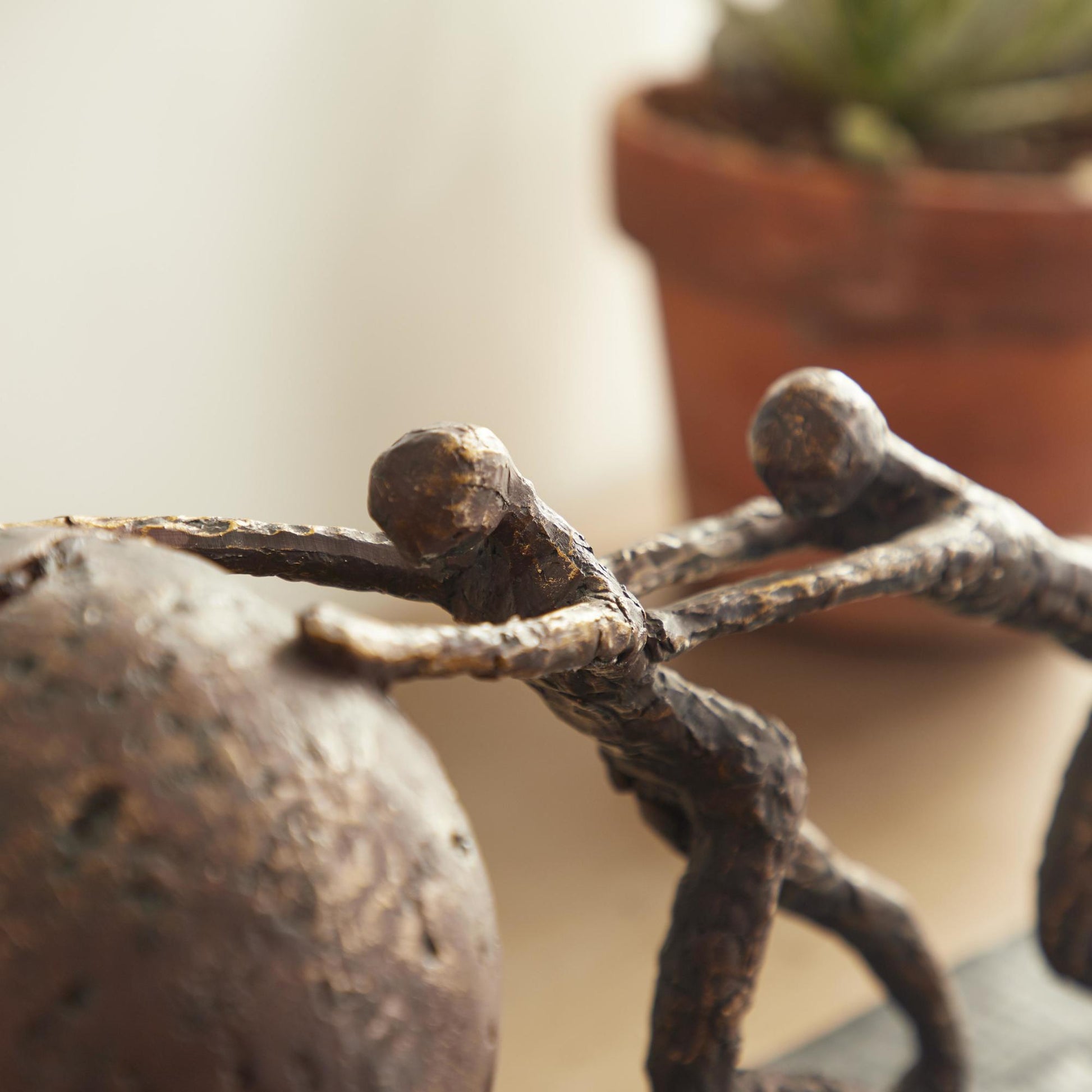 People Brown Polystone Decorative Sculpture with Ball