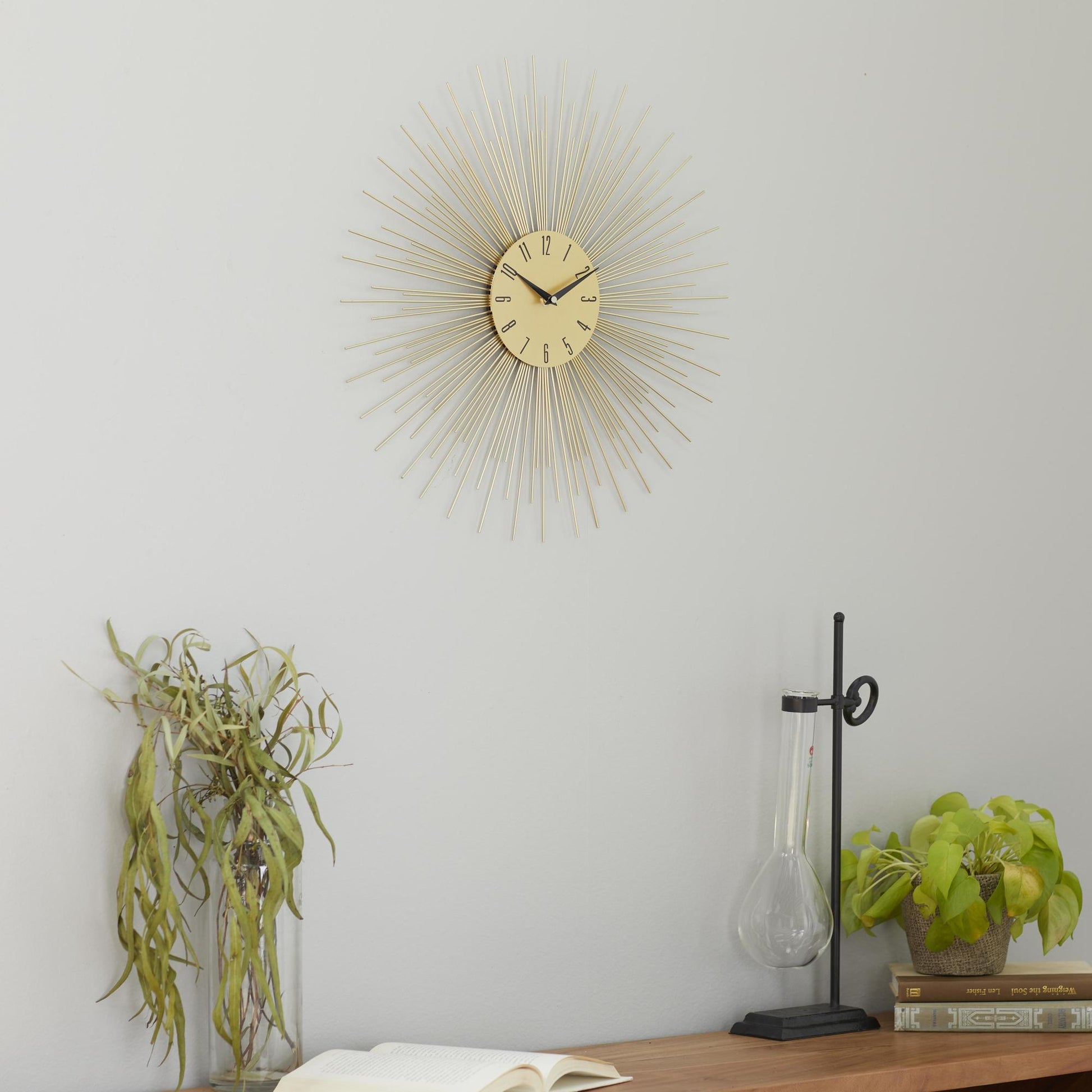 Starburst Gold Metal Decorative Wall Clock with Black Accents