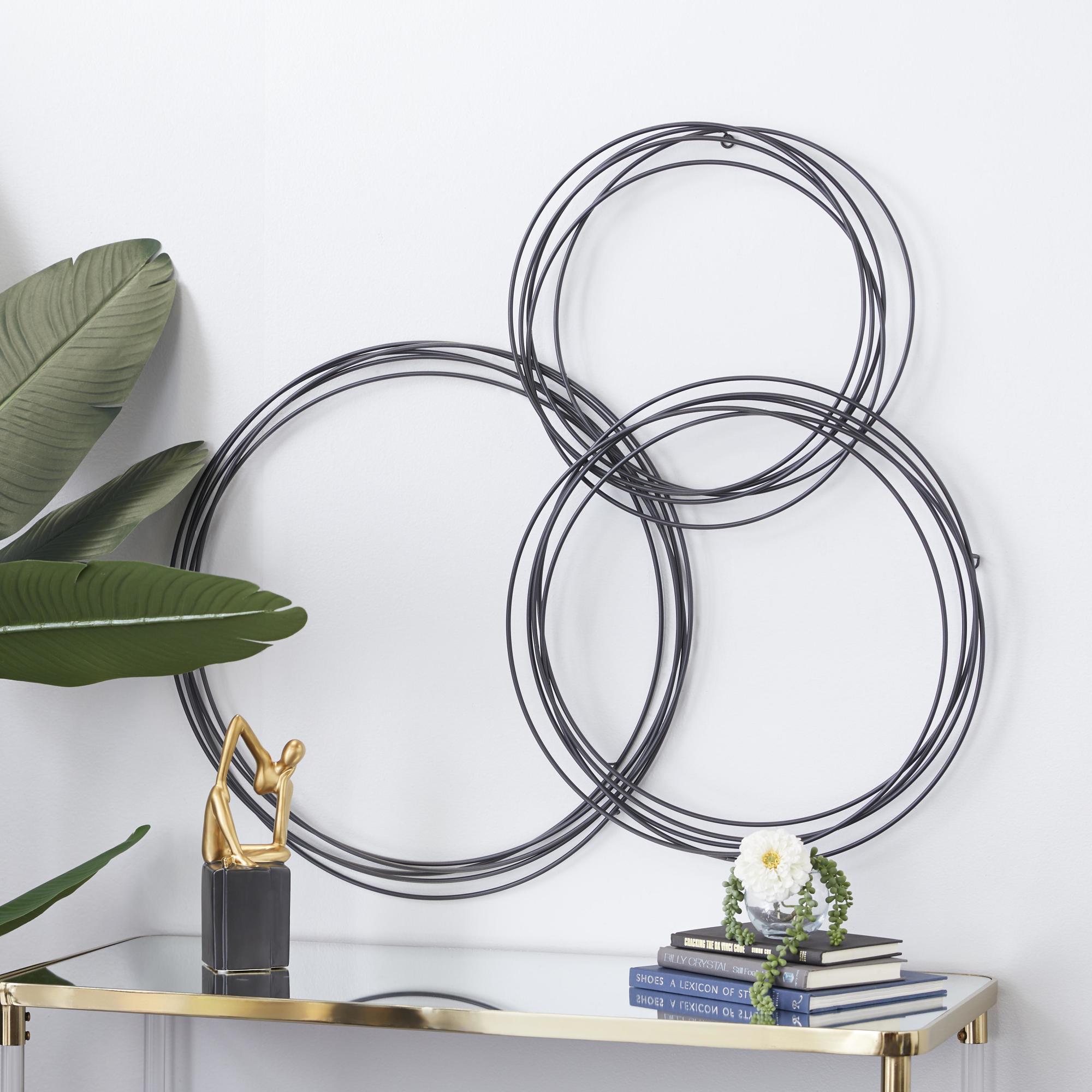 CosmoLiving by Cosmopolitan Plate Metal Overlapping Ring Home Wall Decor