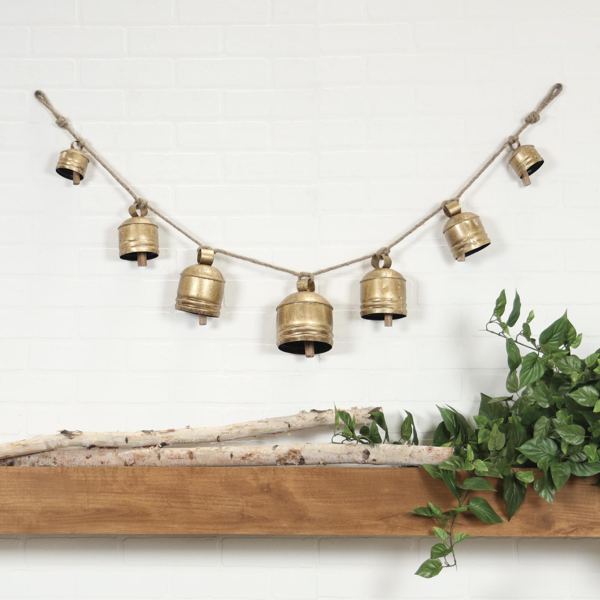 Gold Metal Tibetan Inspired String Hanging Indoor Outdoor Decorative Cow Bells with 6 Bells on Jute Hanging Rope