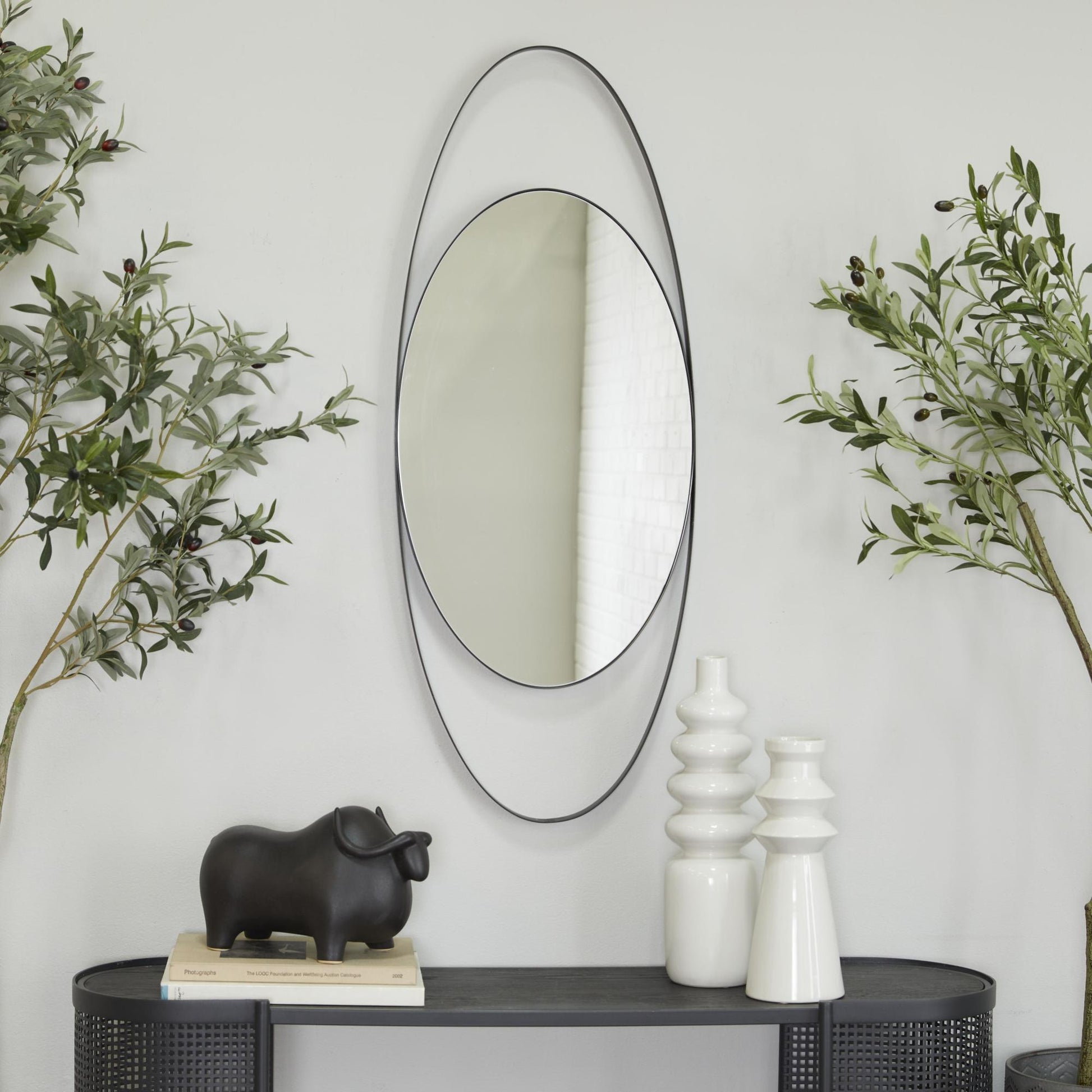 CosmoLiving by Cosmopolitan Black Metal Oval Room Wall Mirror