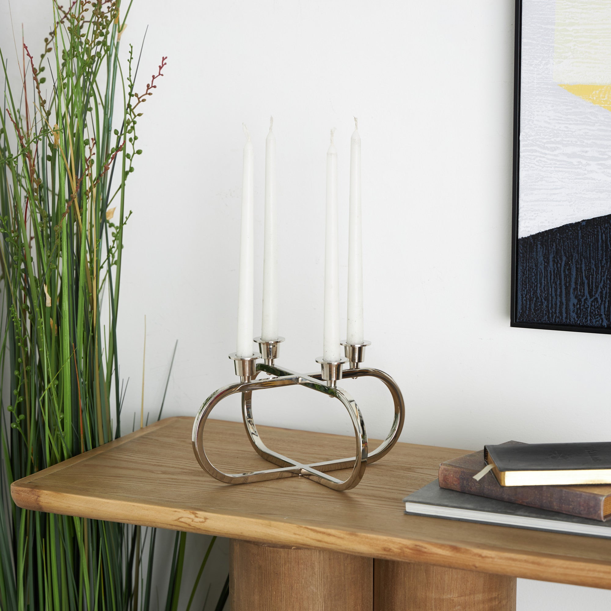 CosmoLiving by Cosmopolitan Geometric Silver Stainless Steel Metal Overlapping Oval Decorative Candelabra