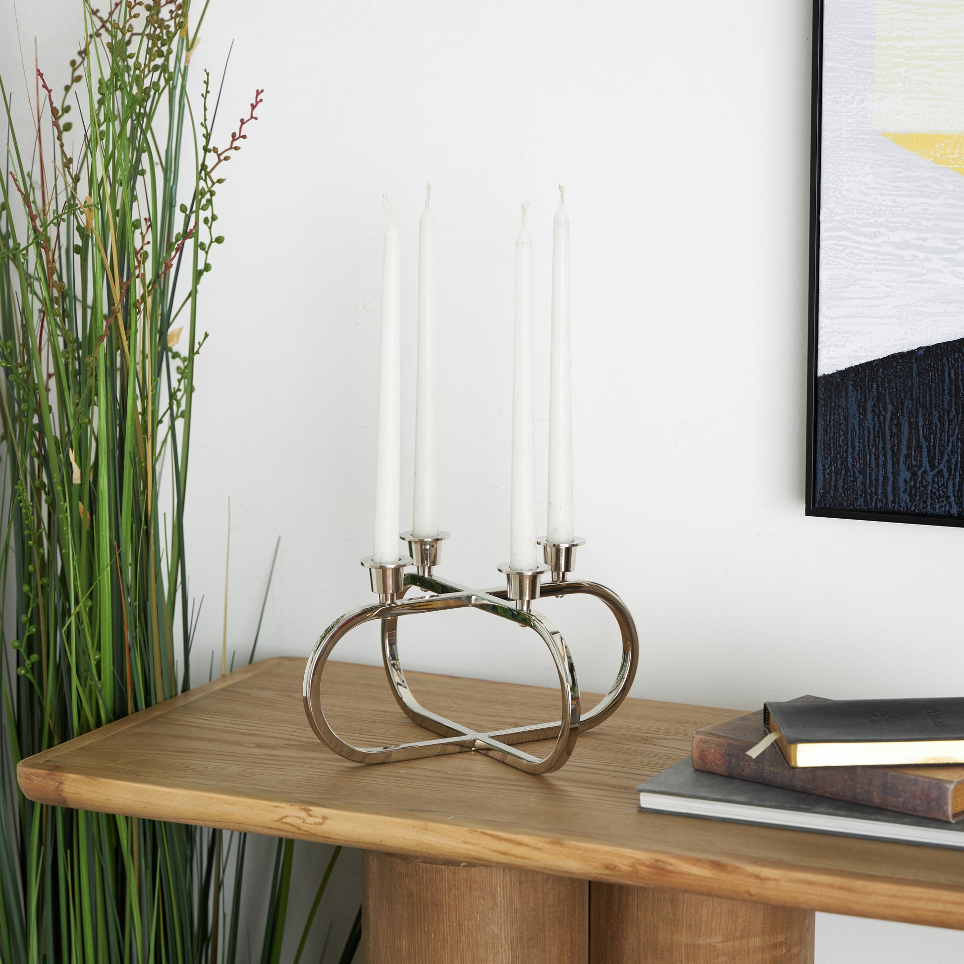 CosmoLiving by Cosmopolitan Geometric Silver Stainless Steel Metal Overlapping Oval Decorative Candelabra