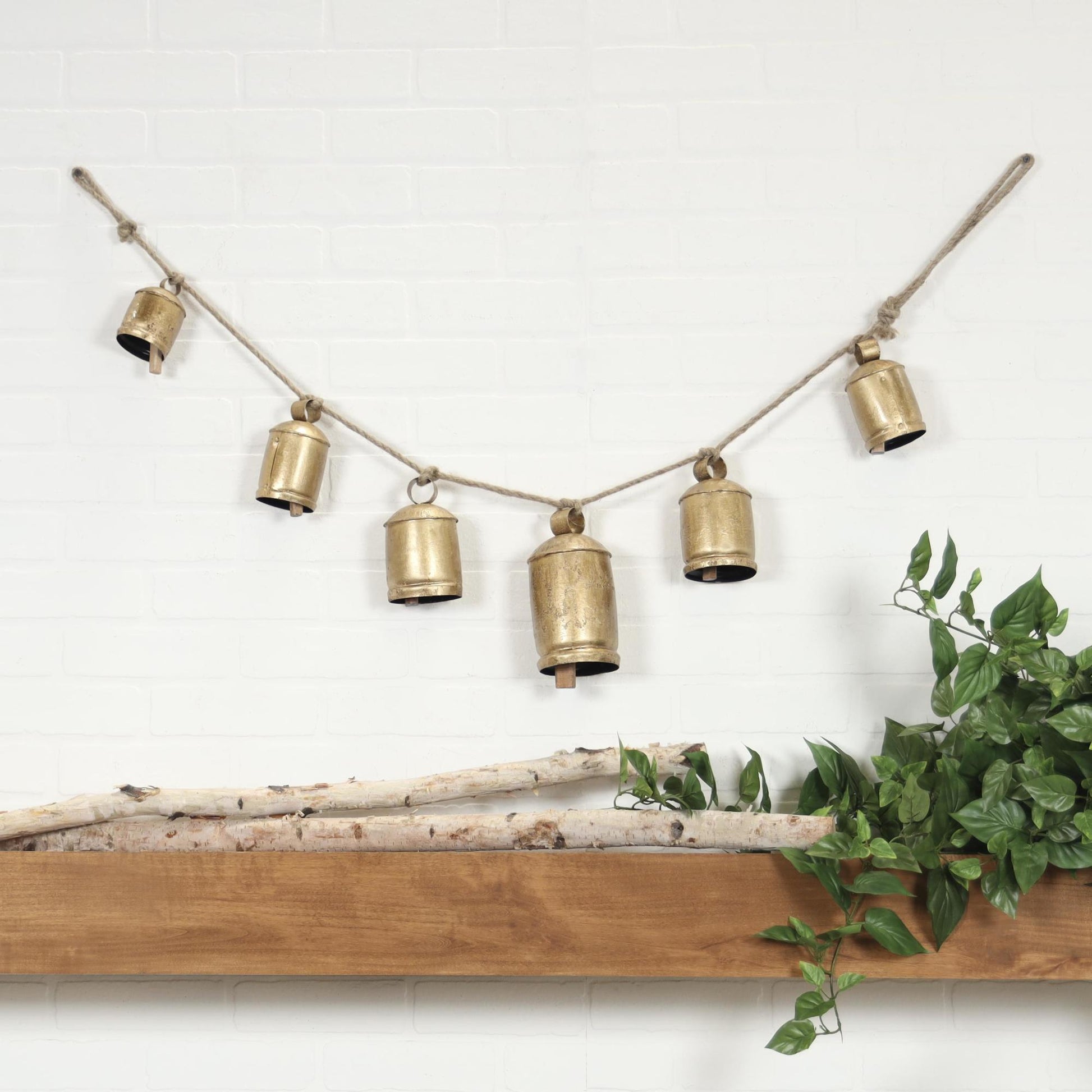 Gold Metal Tibetan Inspired String Hanging Indoor Outdoor Decorative Cow Bells with 6 Bells on Jute Hanging Rope