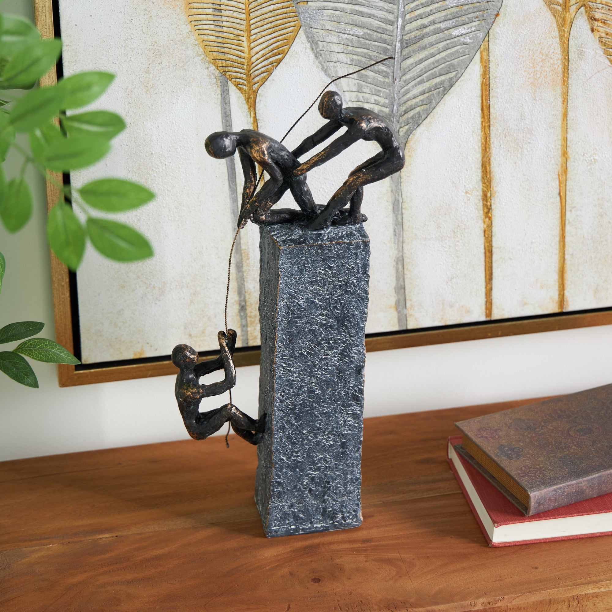 People Gray Polystone Climbing Decorative Sculpture with Bronze Detailing