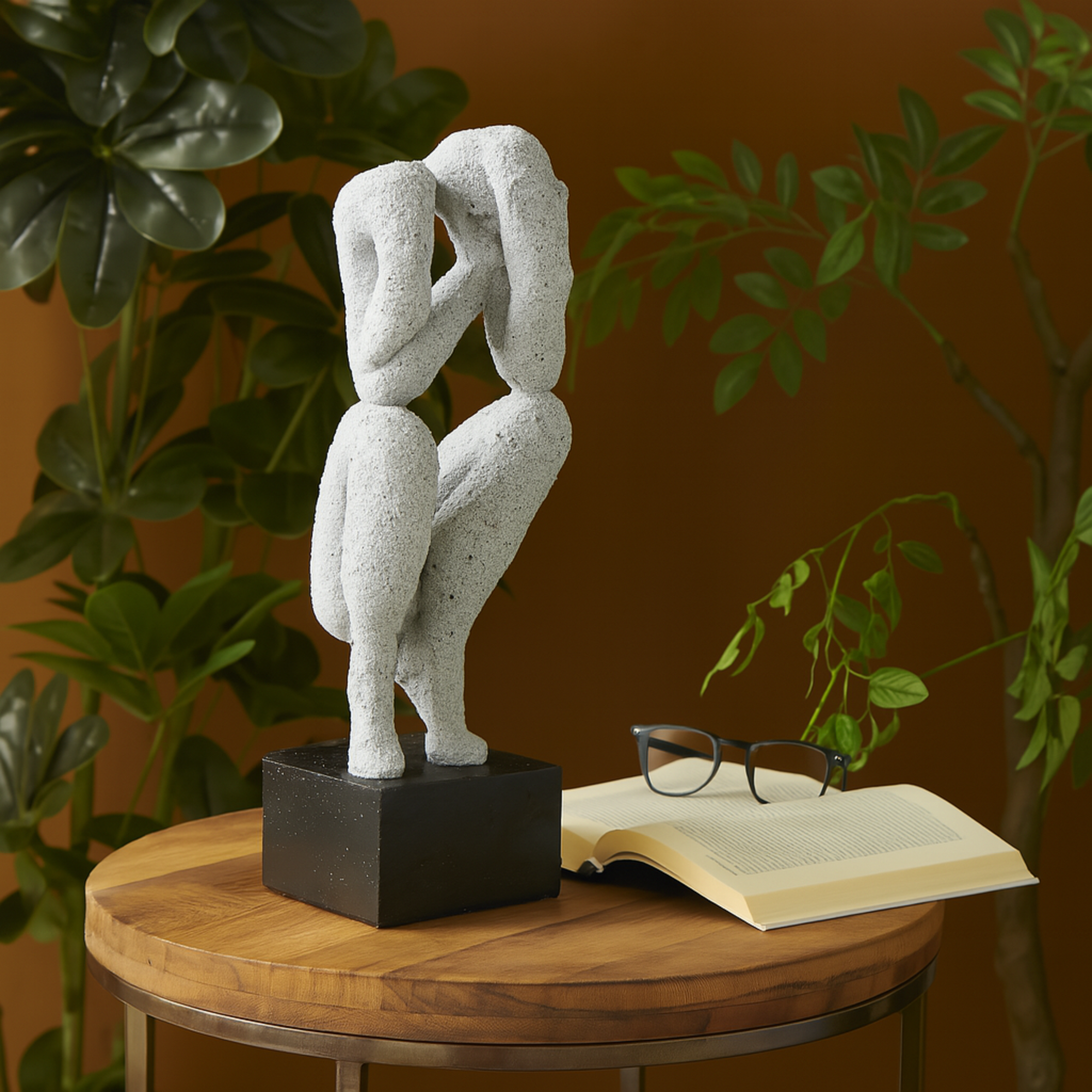 People Gray Polystone Crouching Decorative Sculpture with Black Square Base