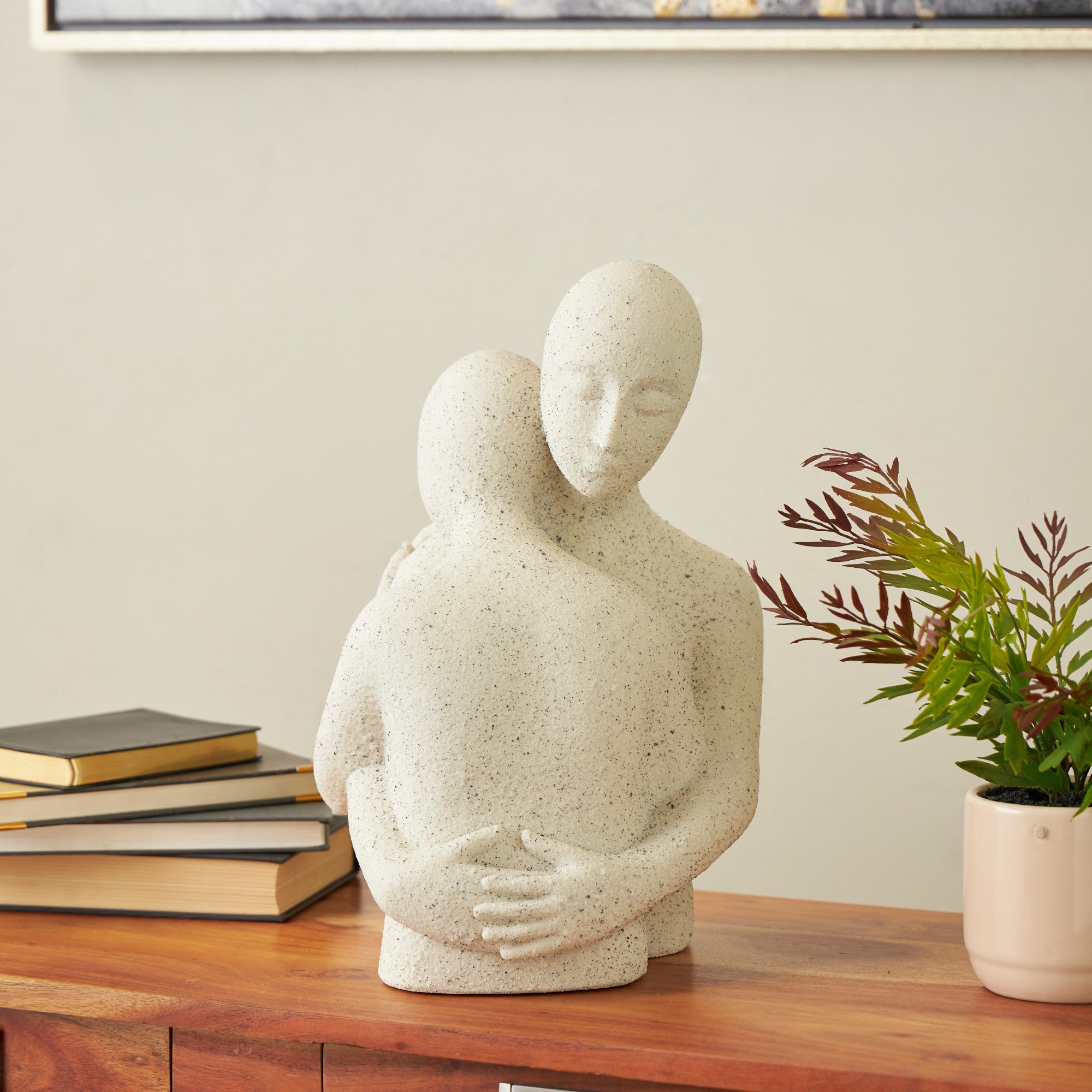 People White Polystone Hugging Decorative Sculpture with Black Speckles