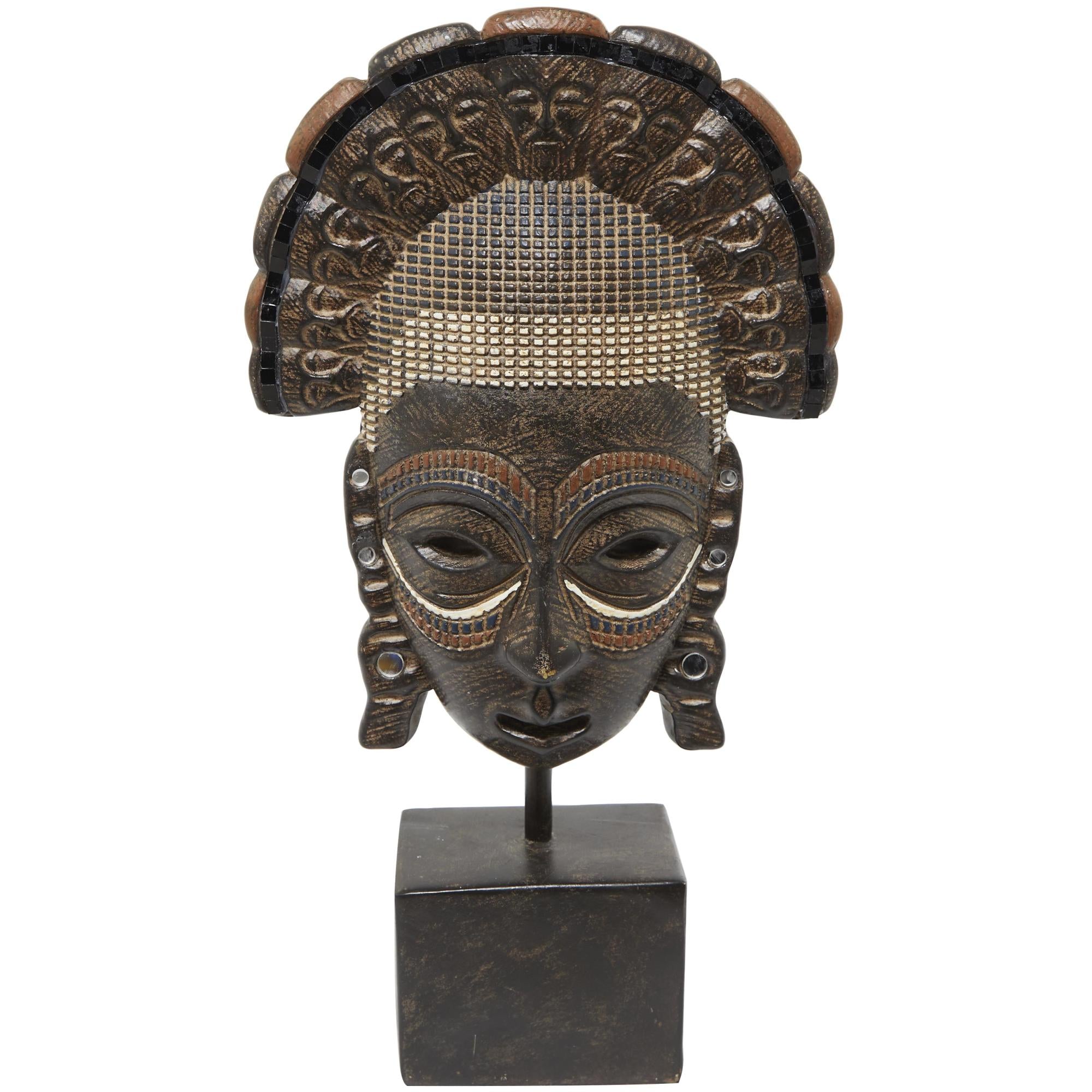 Mask Brown Polystone African Tribal Decorative Sculpture with Rust and Navy Carvings and Block Base