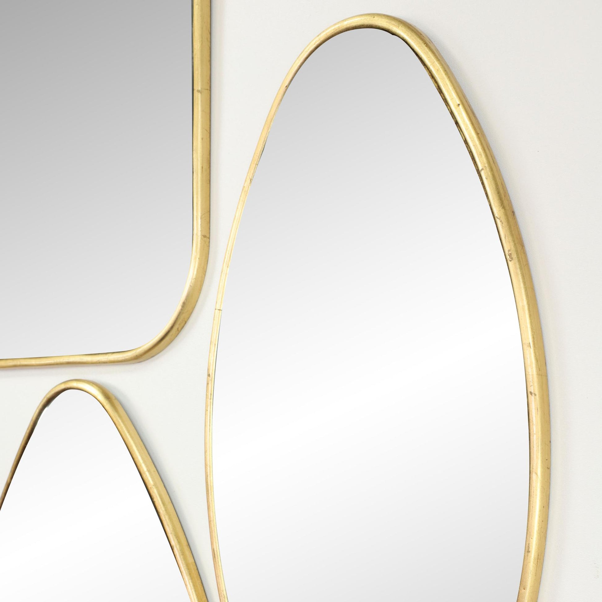 CosmoLiving by Cosmopolitan Set of 4 Gold Metal Room Wall Mirror with Varying Shapes