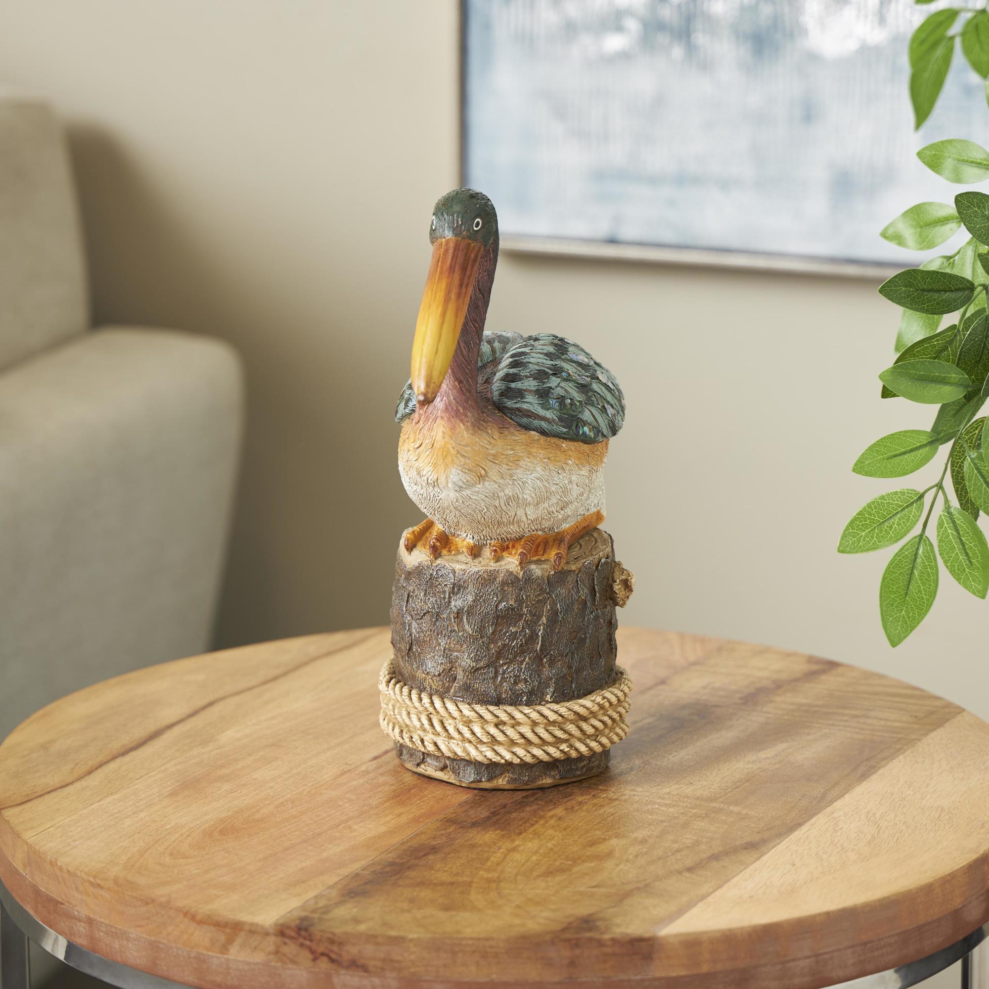 Pelican Teal Resin Textured Sitting Decorative Sculpture with Brown Block and Shiny Accents