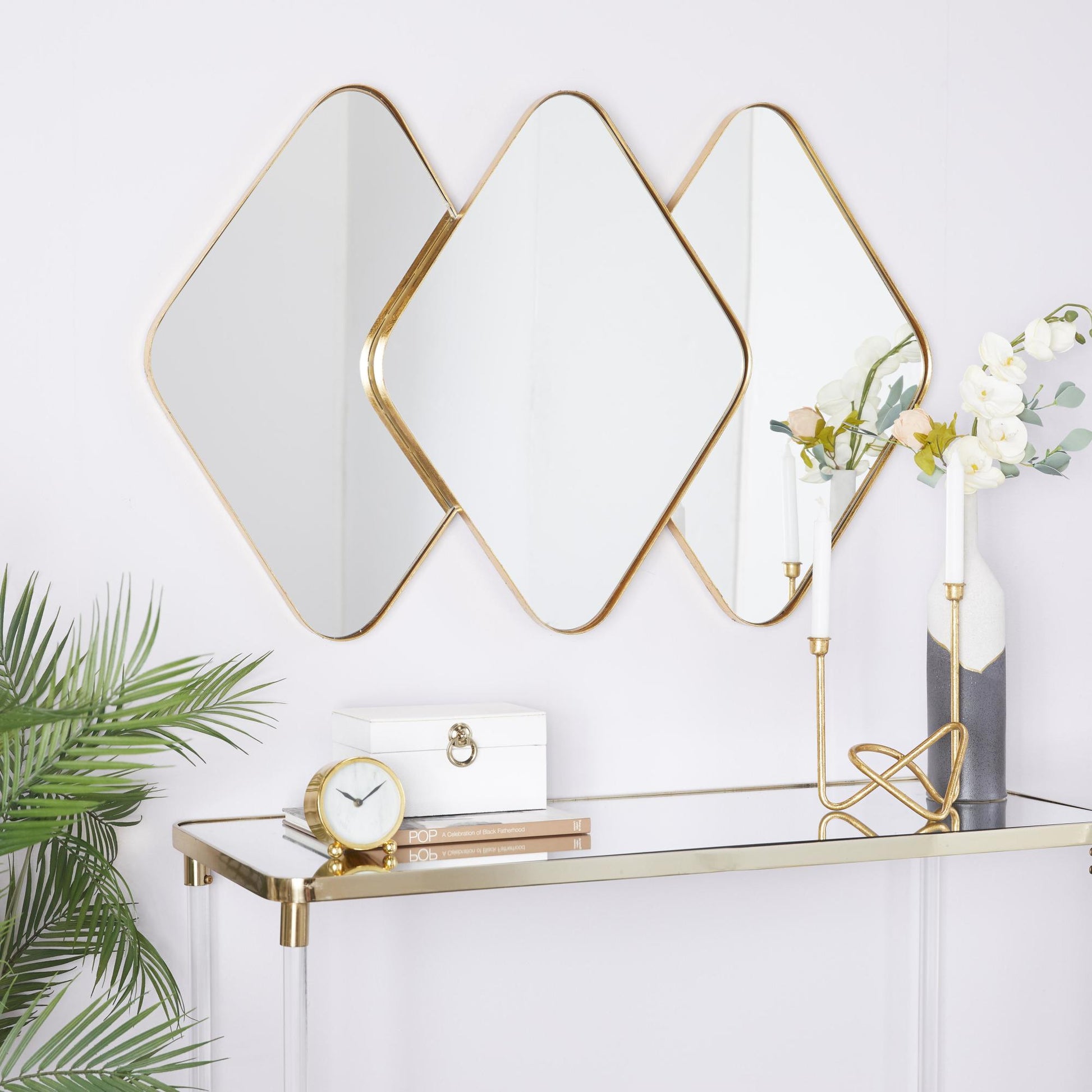 CosmoLiving by Cosmopolitan Gold Metal Overlapping Diamond Room Wall Mirror with Gold Frame