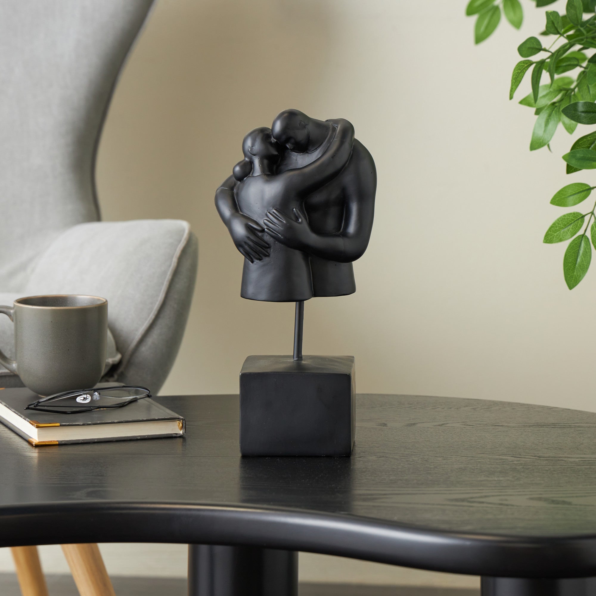 People Black Resin Hugging Decorative Sculpture with Square Base