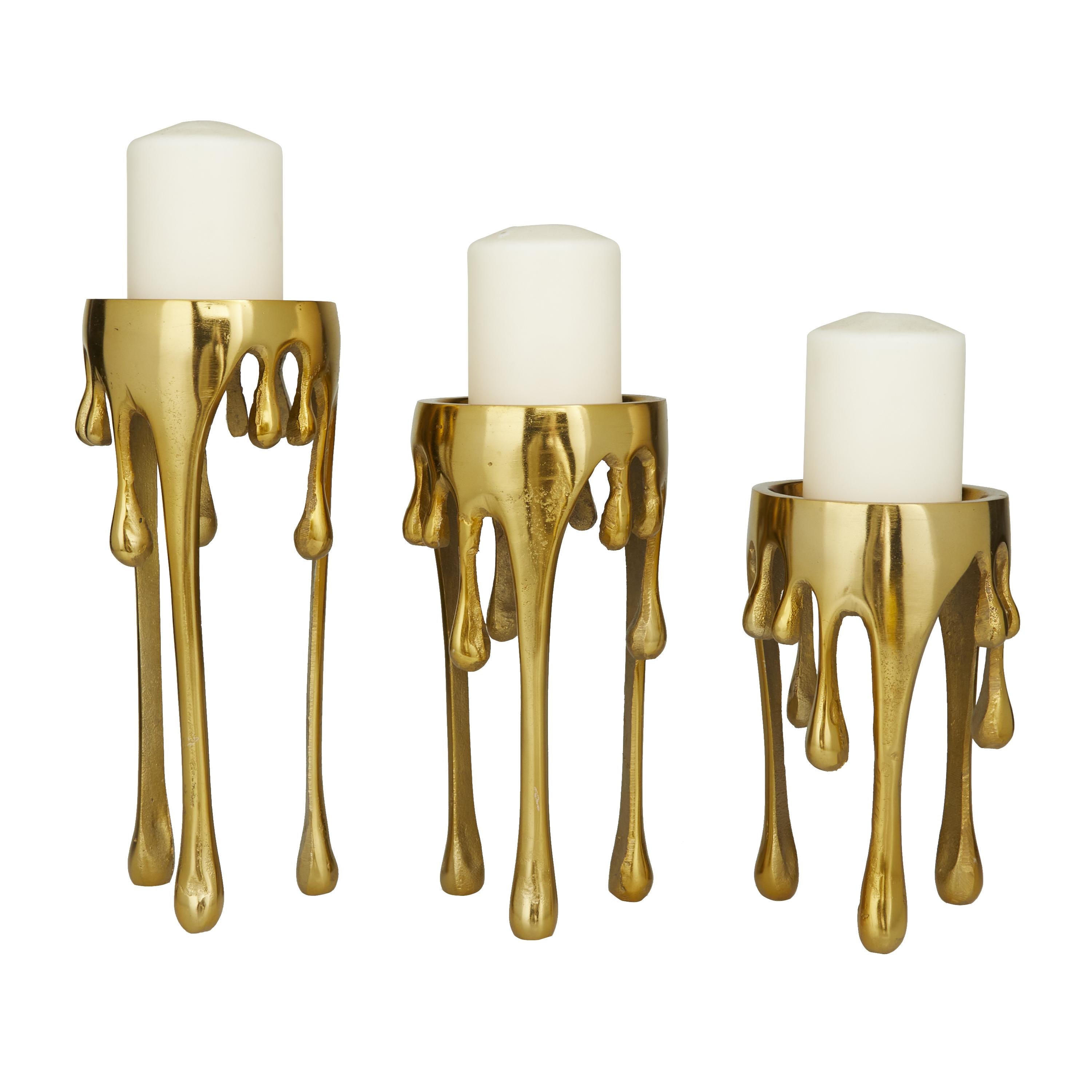 CosmoLiving by Cosmopolitan Set of 3 Abstract Aluminum Metal Drip Decorative Candle Holder with Melting Designed Legs