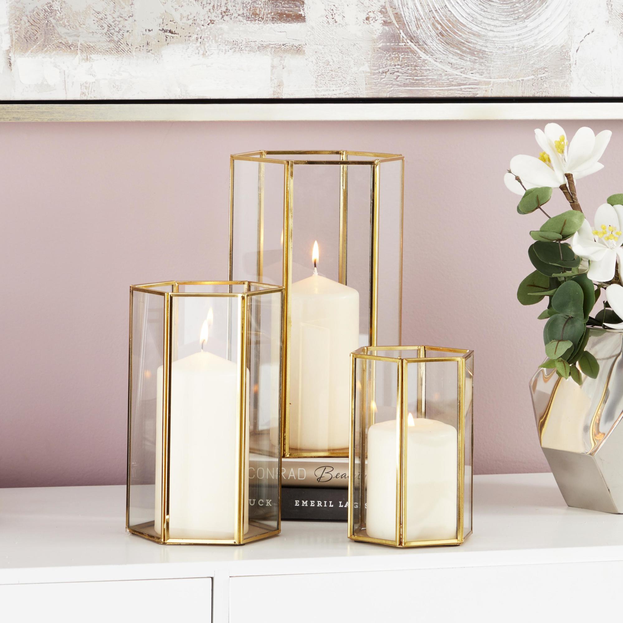 CosmoLiving by Cosmopolitan Set of 3 Gold Glass Decorative Indoor Outdoor Candle Lantern with Metal Plate
