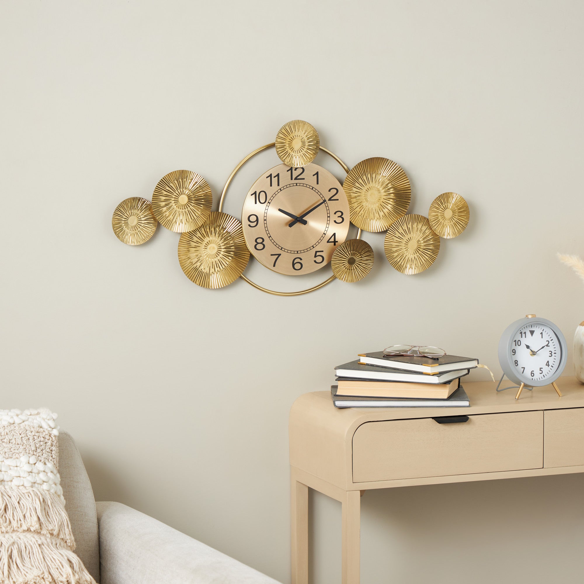 Starburst Gold Stainless Steel Metal Decorative Wall Clock with Black Accents and Overlapping Discs