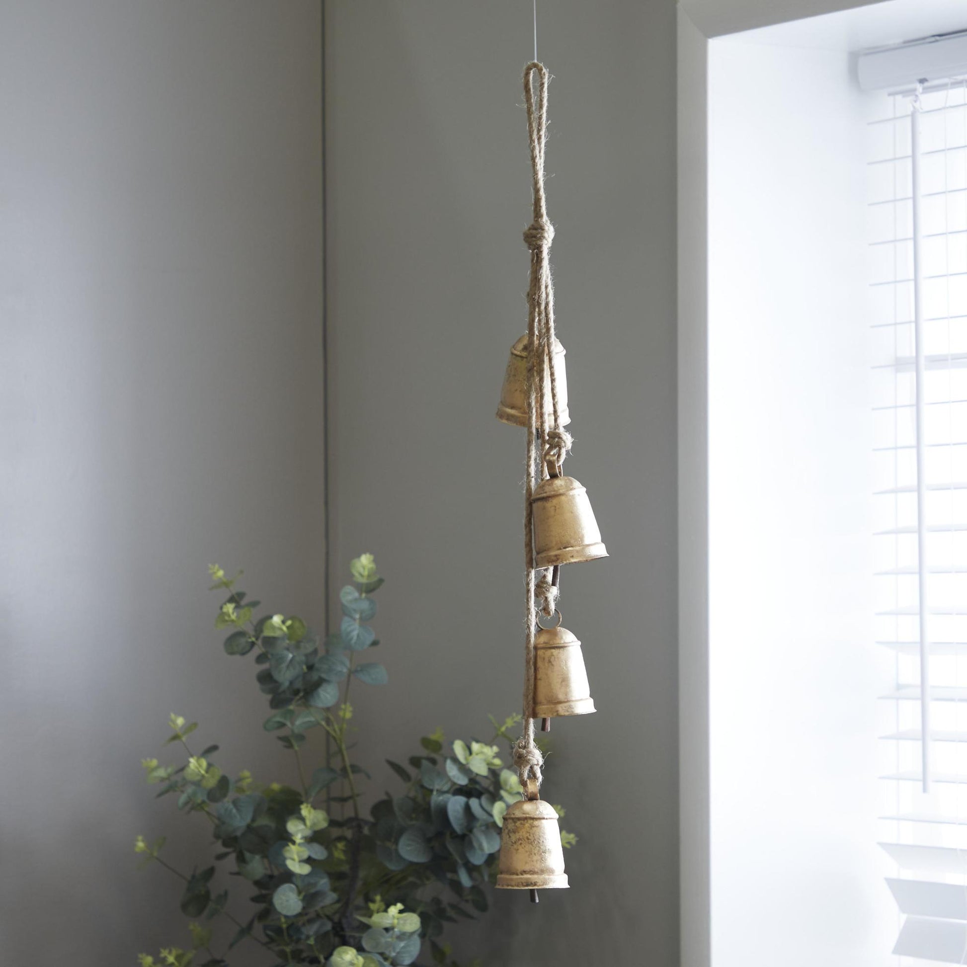Metal Handmade Tibetan Inspired Indoor Outdoor Decorative Cow Bells with 4 Bells on Jute Hanging Rope
