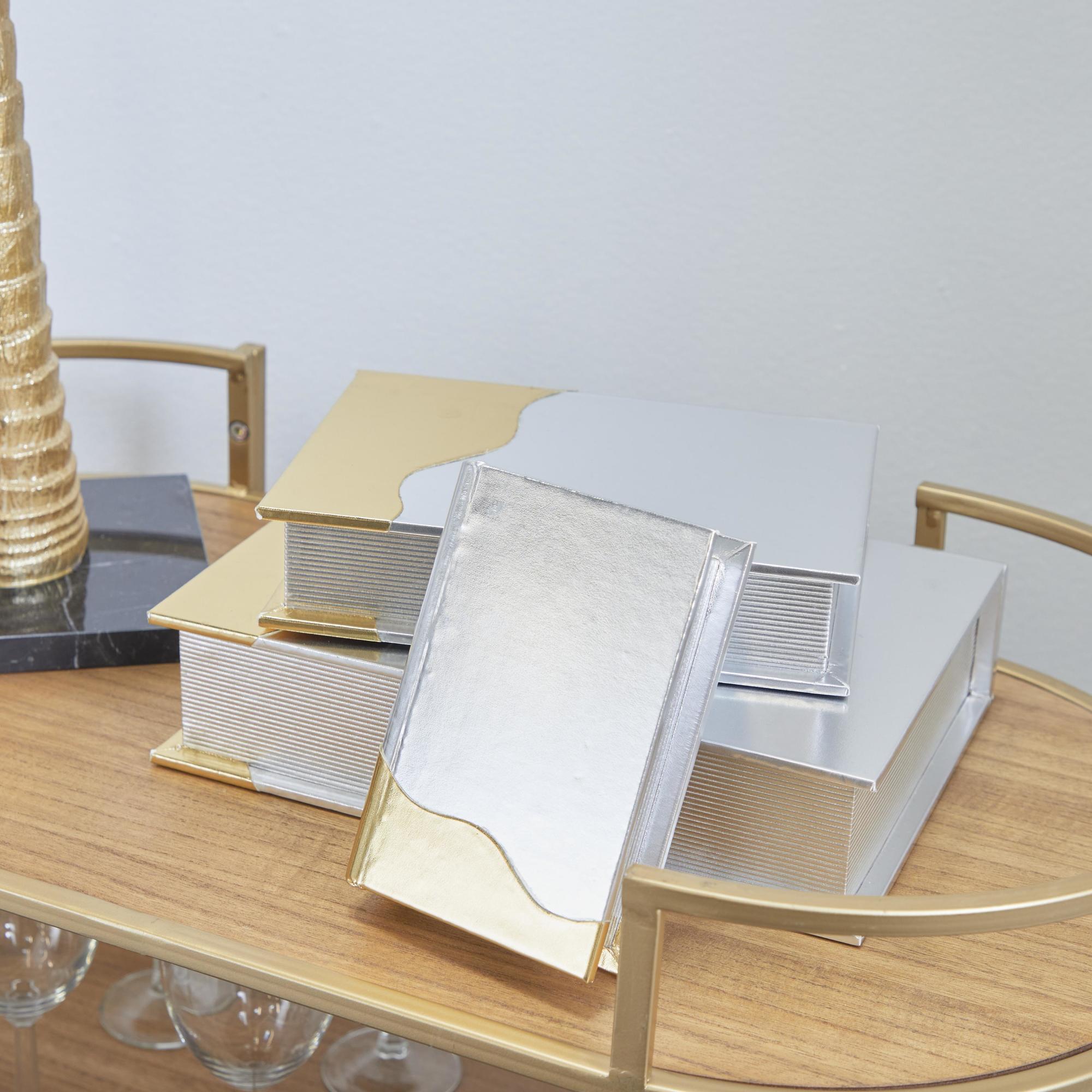 CosmoLiving by Cosmopolitan Set of 3 Silver Faux Leather Metallic Faux Book Storage Decorative Box with Wavy Gold Design