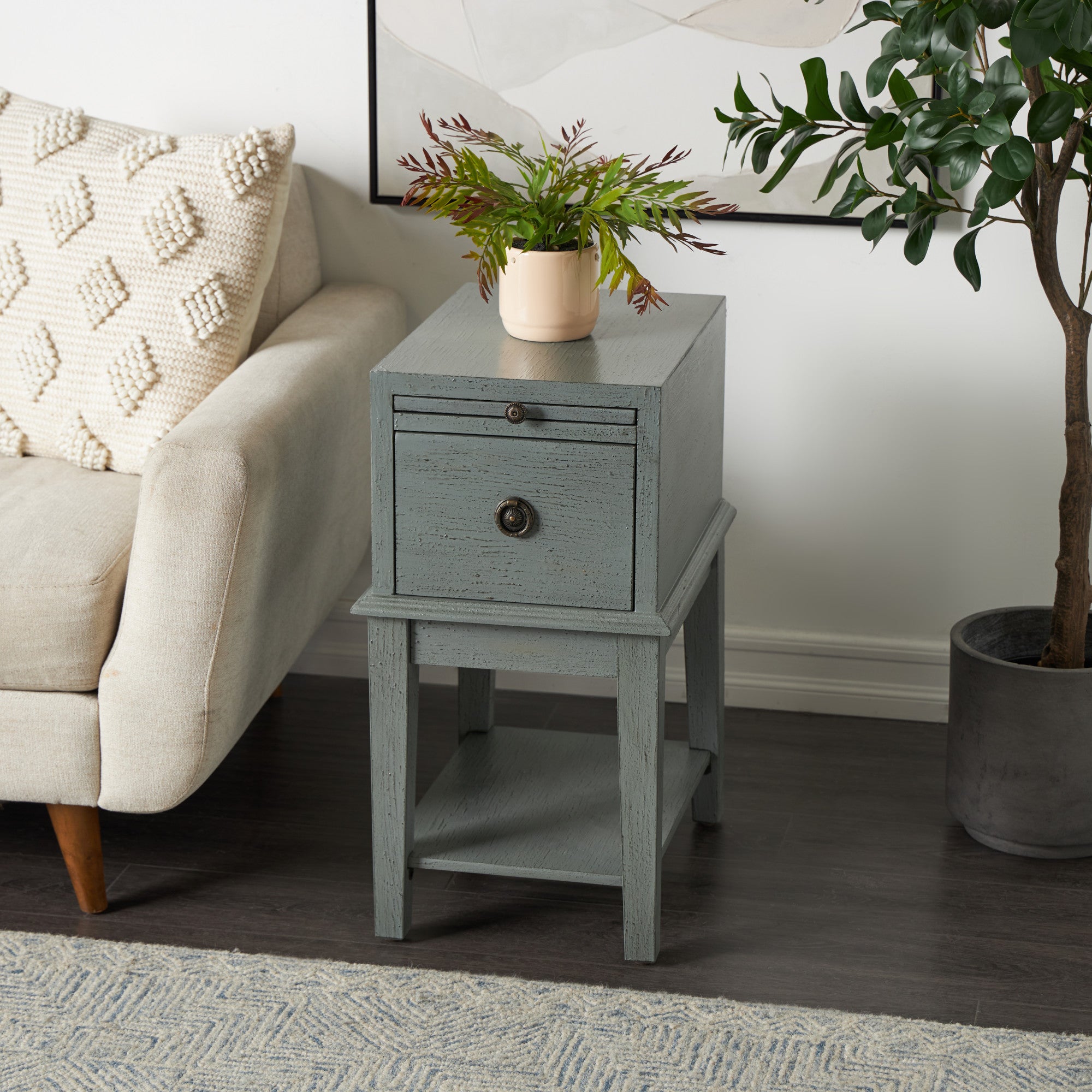 Gray Wooden Textured 1 Drawer Room Accent Table with Sliding Shelf and Bronze Floral Ring Handle